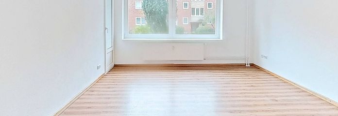 Ihr neues Wohlfühlzuhause in Rendsburg: Geräumige 3-Zimmer-Wohnung mit EBK und BALKON – Ansicht I: Wohn- und Esszimmer