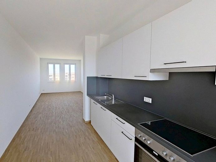 Vivienda moderna en Kronsrode: piso de 4 habitaciones con COCINA EQUIPADA, BALCÓN y LOGIA – Ansicht III: Wohn- und Esszim…