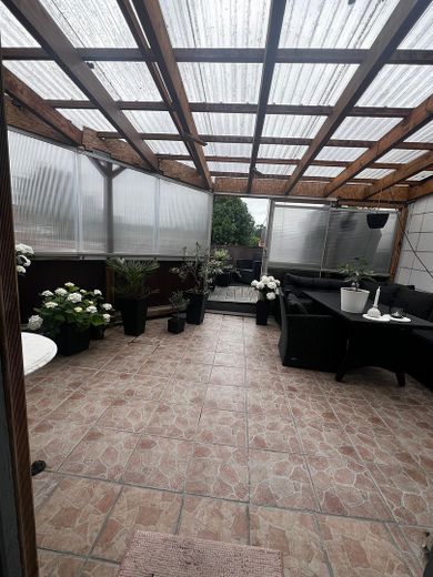 SENZA PROVVIGIONE Casa trifamiliare con vista sul fiordo e interessanti redditi da locazione, circa 300 m2 di superficie abitabile – 1. OG-Wohnung 