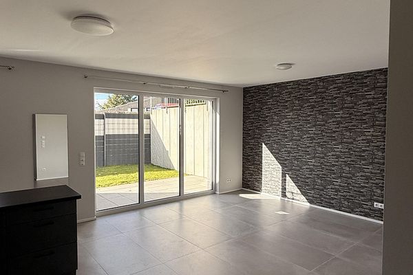 Moderno appartamento di 65m² con terrazza e porzione di giardino