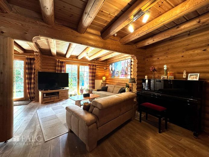Appelhülsen-Skandinavischer Flair trifft moderne Energietechnik - Blockhaus mit besonderem Charakter – Wohnzimmer