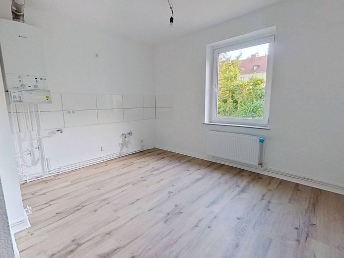 Gemütliche 2-Zimmer-Erdgeschosswohnung mit modernem Wannenbad und viel Lichteinfall – Ansicht I: Küche