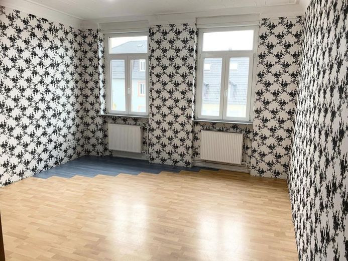8 FH in zentraler Lage MA-Rheinau`s mit Renditeerweiterungs Potential – Wohnzimmer