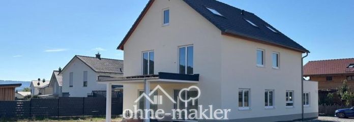 3 Zimmer EG-Wohnung mit traumhaftem Ausblick, großer Terrasse + Garten