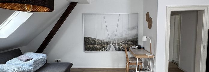 Kapitalanlage: Zwei vermietete Eigentumswohnungen im Gesamtpaket – Wohnzimmer Wohnung 1