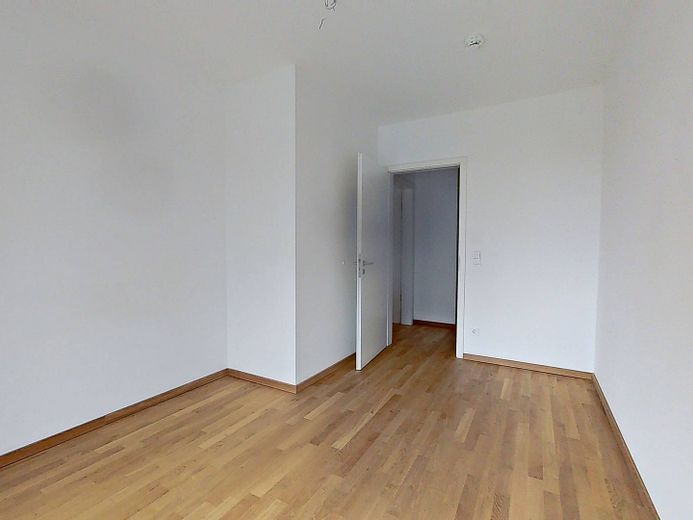 Confort residencial de categoría en una ubicación tranquila: Amplio piso nuevo de 3 habitaciones con terraza soleada y cocina equipada – Ansicht II: Schlafzimmer II