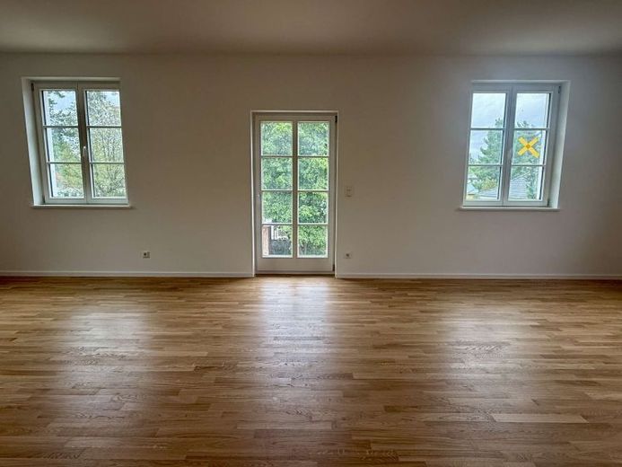 Erstbezug mit Dachboden, großem Balkon und eigenem Grundstücksanteil – Foto 1