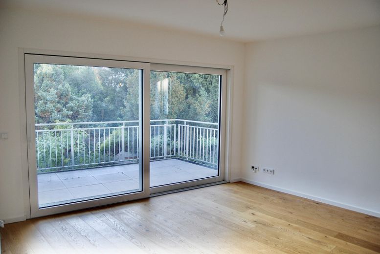 Wohn-/ Esszimmer mit Balkon