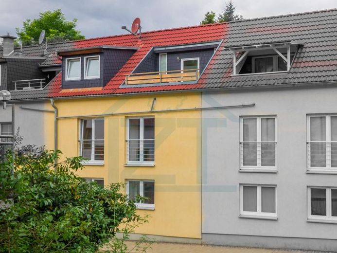 Schicke Eigentumswohnung mit Reihenhauscharakter – Foto 1