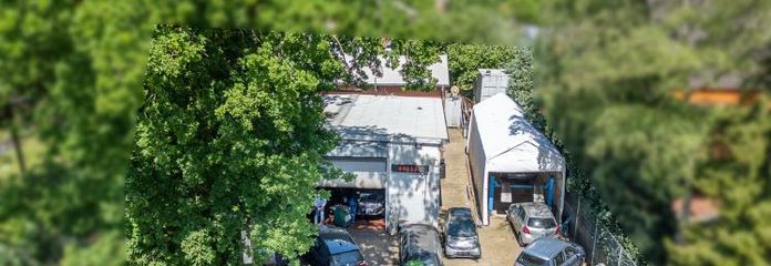 *** Halle d’atelier avec atelier automobile et logement du gérant : vivre et travailler sous un même toit