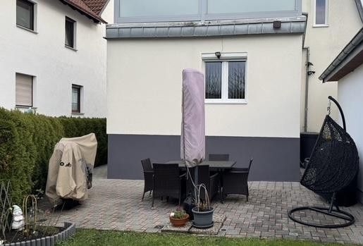 Light-filled detached house in an attractive residential area – Garten zum haus