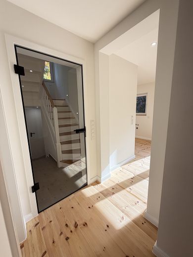 Wohnzimmer Glastür-Loftoptik