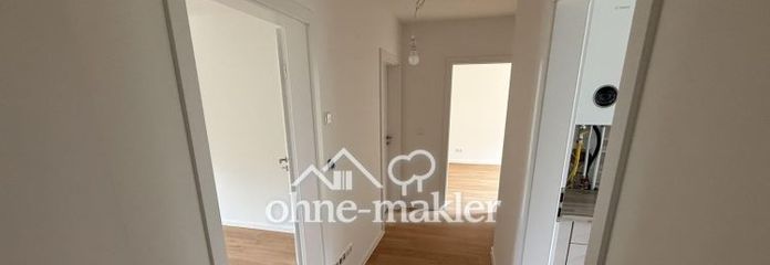 Kernsanierte 3-Zimmer Wohnung im 1. OG mit großem Balkon, Fußbodenheizung und Stellplatz