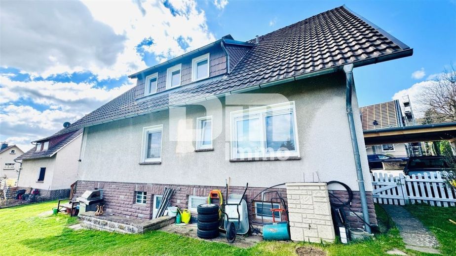 Umfangreich saniertes Ein- bis Zweifamilienhaus in idyllischer Ortsrandlage – Rückansicht