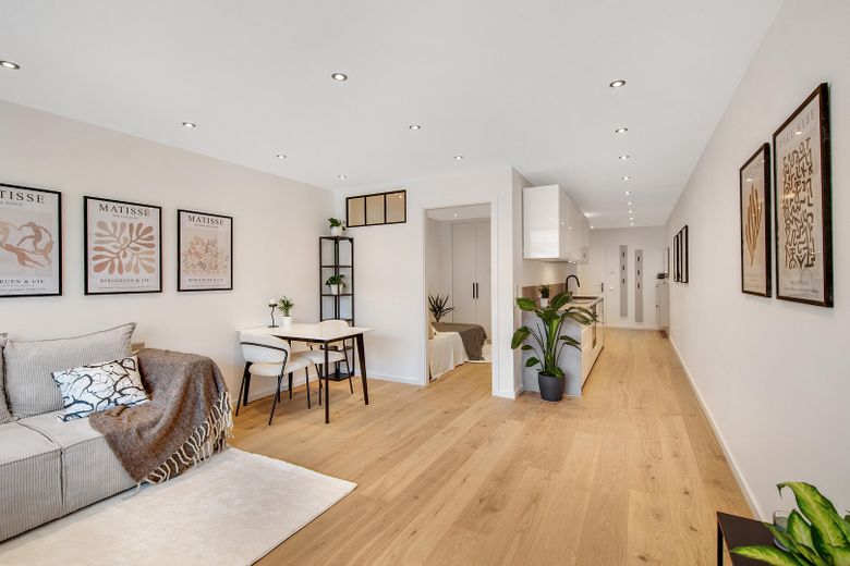 Erstbezug nach Kernsanierung: Exklusive Designerwohnung mit EBK, Balkon & TG-Stellplatz – Wohnzimmer/Esszimmer