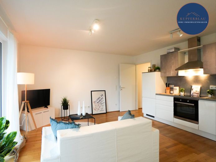 Moderne 2-Zimmer-EG-Eigentumswohnung mit Terrasse und Stellplatz in Bonn-Hochkreuz – Wohnbereich
