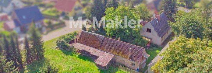 Renovierungsbedürftiges Einfamilienhaus auf großem Grundstück mit 2 Garagen und viel Potenzial