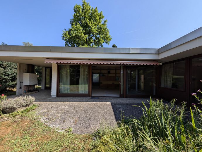 Wohnzimmer und Kaminsitzecke