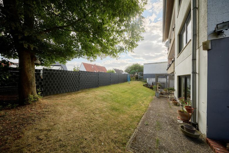 Investimento con prospettiva – 4-MFH con suddivisione WEG e 4 libri fondiari in 32278 Kirchlengern – Gartenansicht