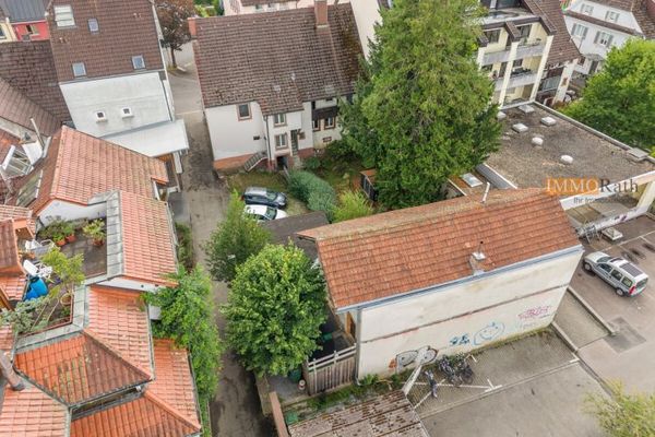IMMORath.de – Dwa domy z powierzchnią sklepową i ogrodem