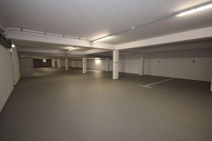 Appartement en copropriété haut de gamme de 2 pièces avec terrasse et place de parking en sous-sol – Tiefgarage