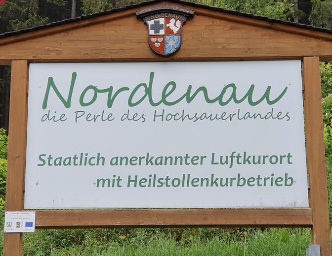 Schild am Dorfeingang