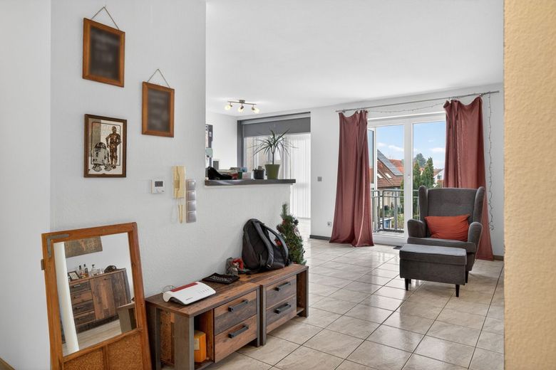 Freiwerdend: Moderne Wohnung mit Balkon und TG in zentraler Lage – Wohnbereich