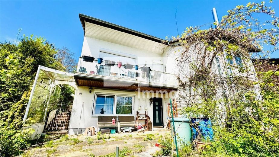 Umfangreich saniertes EFH inkl. PV-Anlage, Terrasse, Wintergarten und Garage – Frontansicht