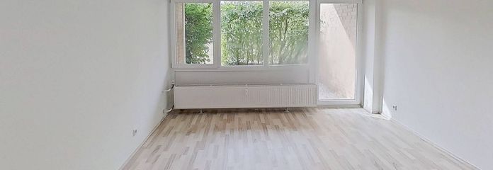 Moderne 2-Zi.-Whg. mit privater Terrasse und Wannenbad im Burgdorfer Süden – Ansicht I: Wohn- und Esszimmer