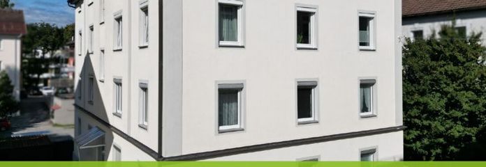 Stilvolle 3-Zimmerwohnung in zentraler Lage – Einbauküche und Garage inklusive