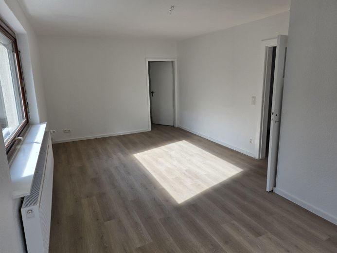Casa unifamiliare con ampio giardino in posizione privilegiata – EG Wohnzimmer