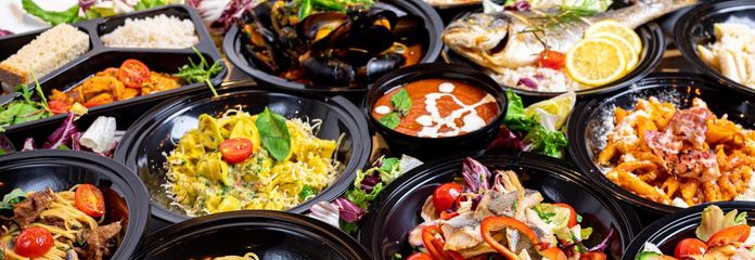 closeup-shot-restaurant-menu-set-black-plates-perfect-food-background