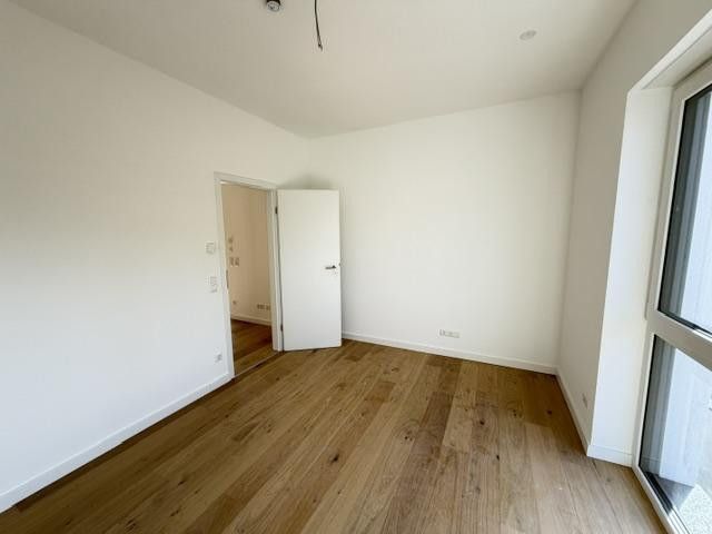 Erstbezug – Möblierte 2-Zimmer-Neubauwohnung im KfW-55-Effizienzhaus Metzingen – Originalbild/Schlafzimmer