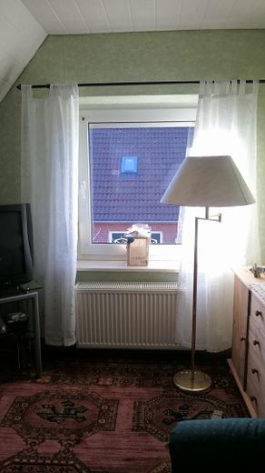 Wohnzimmer obere Wohnung