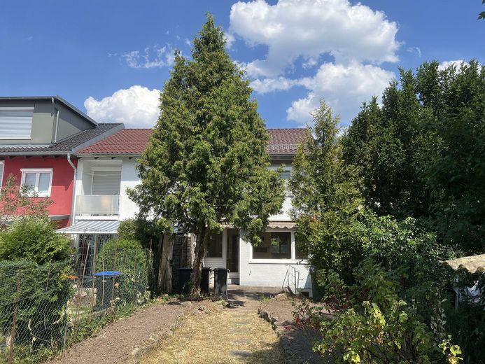 Charmantes Reihenhaus mit ausgebautem Dachboden und schönem Außenbereich - zzgl. Garage – Garten