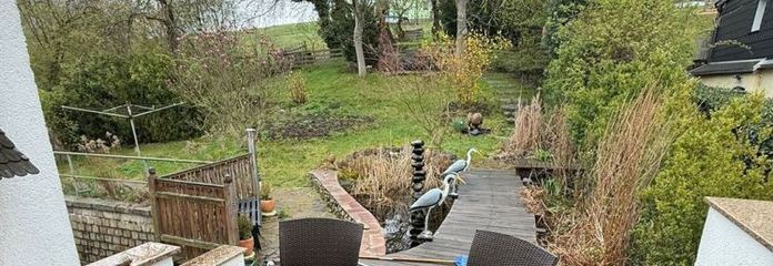 4-Zi. mit Laminat, Küchenofen, Terrasse, Kachelofen und offener Küche in zentraler Lage!
