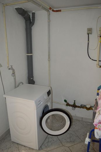 "Attraktives Reihenhaus" in "Weser"-Nähe, ruhige Lage, im schönen "Bremer Norden" – Waschküche im KG