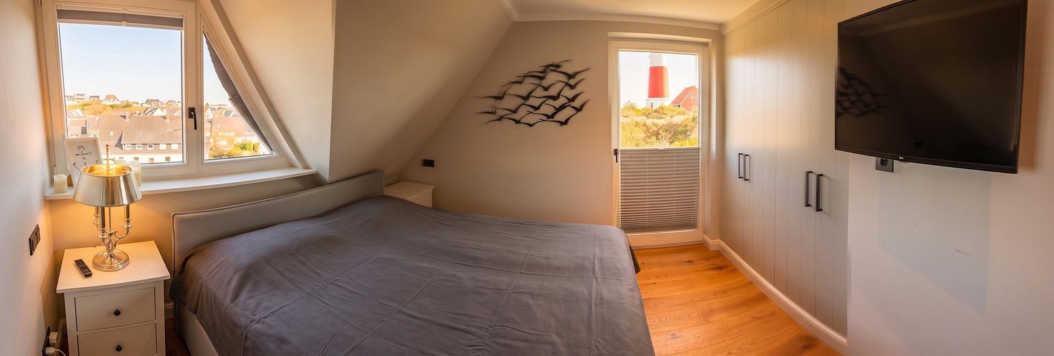 Haus am Leuchtturm – Master Schlafzimmer