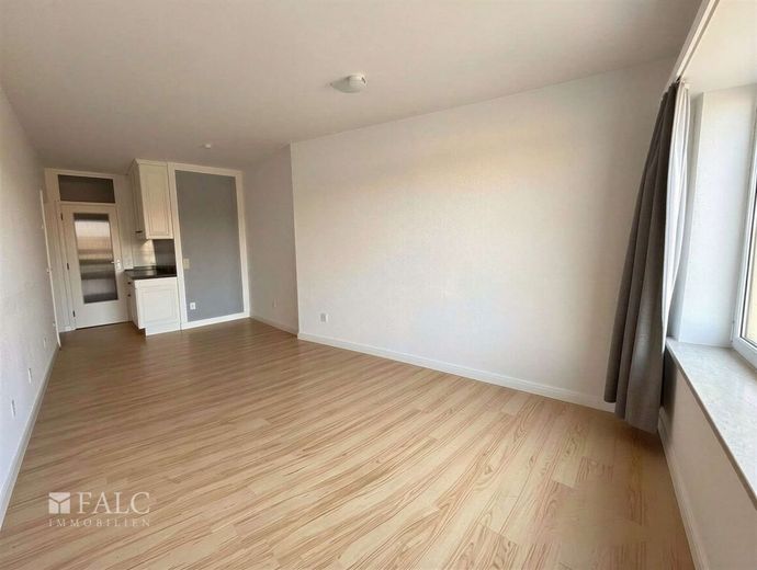 Dem Wasser so nah - 1-Zimmer-Apartment mit traumhaftem Blick – Wohn- und Schlafbereich Bild 4 - Unmöbliert