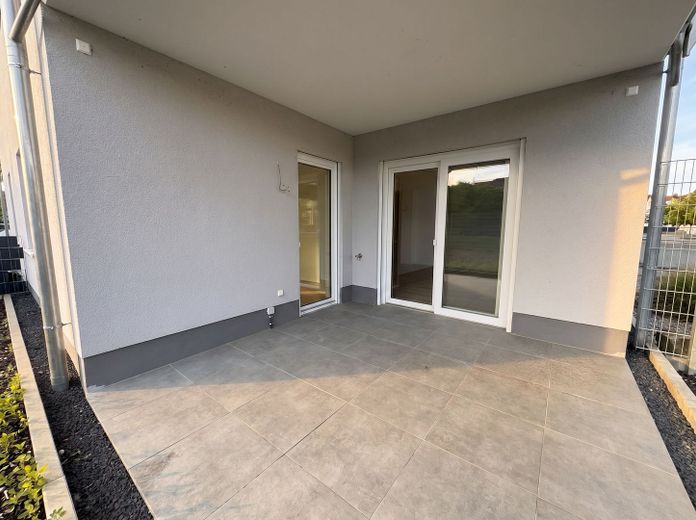 First occupancy! New, bright, barrier-free 3-room ground-floor apartment with garden in a central location in Jockgrim – Terrasse 12,5 m²