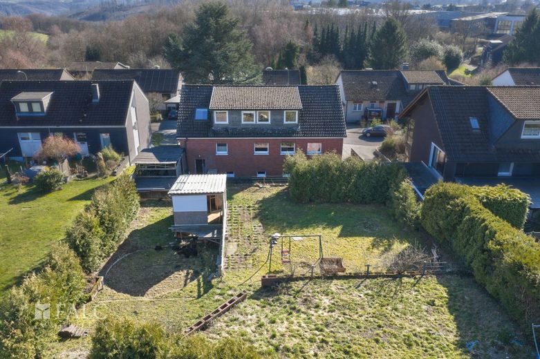 Raumwunder mit Rendite: Ideal für Großfamilien oder Anleger. – Garten
