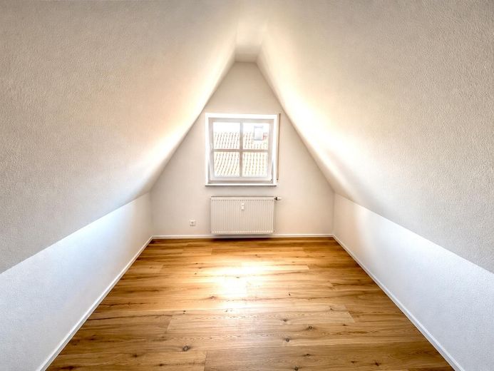 Appartamento maisonette di 4,5 locali con balcone e garage – Zimmer 1