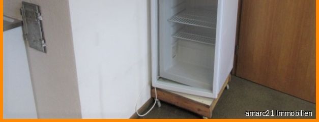 ...einem Kühlschrank,...