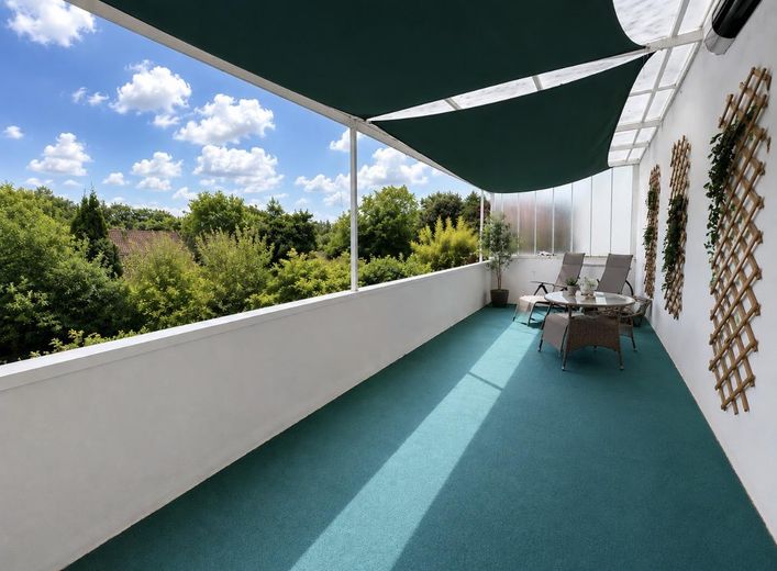 Balkon über gesamte Hausbreite