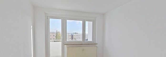 شقة حديثة من 3 غرف مع شرفة تطل على أسطح روستوك – Ansicht I: Wohnzimmer