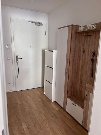 Moderne 2-Zimmer-Neubauwohnung mit hochwertiger EBK - Stilvoll wohnen in bester und ruhiger Lage – Eingang