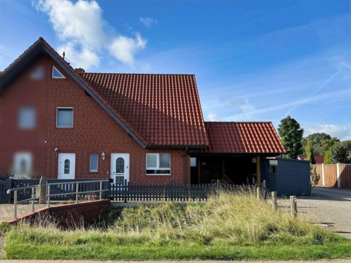 Gepflegte Doppelhaushälfte in ruhiger Feldrandlage von Bröckel – Foto 1