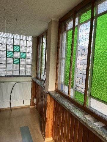 Veranda mit Originalfenstern