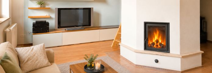 Exklusive Dachgeschosswohnung mit Galerie, Kamin und außergewöhnlichem Wohnambiente – Wohnzimmer  mit Kamin +Galerie