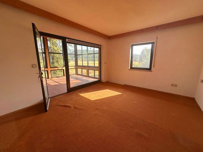 Wohnensemble aus zwei verbundenen Hausteilen – 244 m² Wohnfläche, Wintergarten & Sauna – Hinterhaus Schlafzimmer
